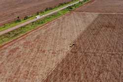 A machine plants soybeans on a farm in a rural area of Sidrolandia, Brazil, Oct. 22, 2022.