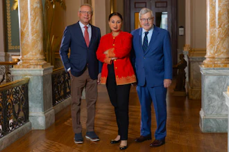 From left, Paul Schickler, Mashal Husain and Terry Branstad, Nov. 14, 2024.