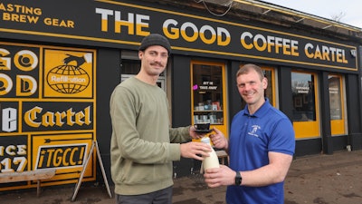 Mossgiel Organic Farm owner Bryce Cunningham, right, with barista Jacob Smith outside The Good Coffee Cartel, Glasgow.