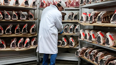 John Jobbagy shows dry aged beef during an interview at J.T. Jobbagy Inc. in the Meatpacking District of Manhattan, Nov. 19, 2024