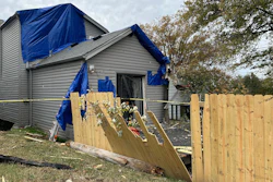 A residential fence near a Louisville, Kentucky, plant that exploded, Nov. 13, 2024.