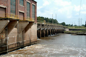 Water swirls through the Georgia Power Co. dam on the Flint River north of Albany, Ga., Aug. 18, 2003.