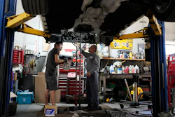 Auto mechanics at Express Auto Service Inc., Chicago, Sept. 19, 2024.