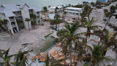 Debris lies scattered on Manasota Key, Fla., following the passage of Hurricane Milton, Oct. 11, 2024.