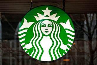 A Starbucks logo sign in the window of one of the chain's cafes in Pittsburgh, Jan. 12, 2017.