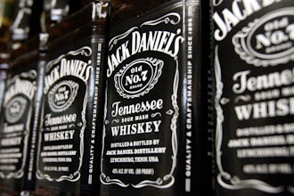 Bottles of Jack Daniel's Tennessee Whiskey line the shelves of a liquor outlet in Montpelier, Vt., Dec. 5, 2011.