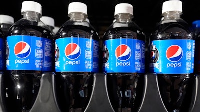 Pepsi soda bottles are on display for sale Friday, Feb. 5, 2021, in Dallas.