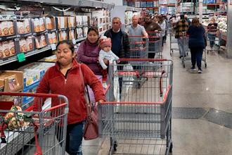 Customers wait in line for eggs at a Costco store in the Van Nuys section of Los Angeles, Feb. 19, 2025.