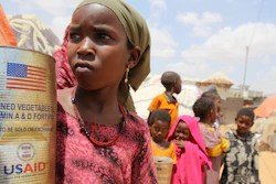 Somali internally displaced persons (IDP) children look out from makeshift homes in Maslah camp on the outskirts of Mogadishu, Somalia, Feb. 5, 2025.