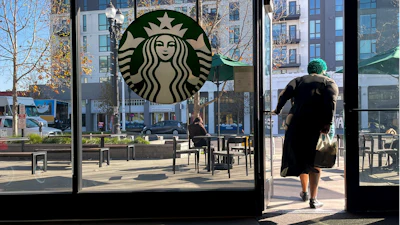 A customer exits a Starbucks store in Oakland, Calif., Jan. 16, 2025.