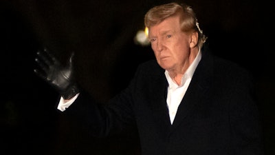President Trump gestures as he walks across the South Lawn of the White House, March 2, 2025.