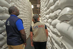 Officials from USAID and WFP inspect a donation of $11 million worth of food aid at a ceremony in Harare, Zimbabwe, Jan 17. 2024.