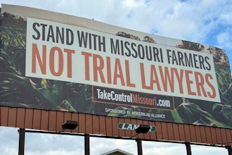 A billboard supporting legislation that would provide legal protection to manufacturers of pesticides such as Bayer's popular weedkiller Roundup, is shown in Jefferson City, Mo., May 13, 2024.