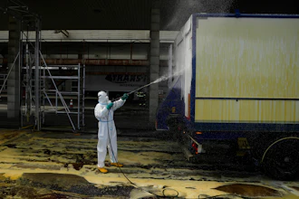 A firefighter sprays a truck with disinfectant to try to prevent the spread of a the highly infectious foot-and-mouth disease from Slovakia at the border in Lanzhot, Czech Republic, April 11, 2025.