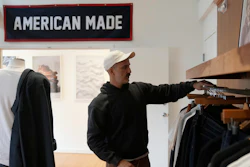 Javid Moghaddasnia, Director of Customer Engagement, discusses American Giant clothing while being interviewed at the company's showroom in San Francisco, Thursday, April 17, 2025.