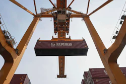 Cranes work on stacks of containers at the Bangkok Port in Bangkok, Thailand, April 10, 2025.