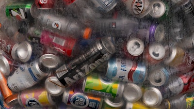 Used beverage containers are seen in a bag outside the Glisan BottleDrop Redemption Center on Thursday, May 15, 2025, in Portland, Ore.