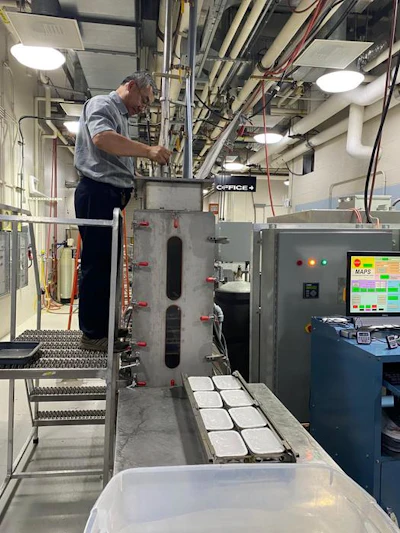 Trays of lentil hummus after undergoing the microwave pasteurization (MAPS) process. This process can keep the tasty dip safe for up to 30 days in a refrigerator if unopened.