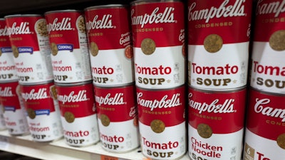 Cans of Campbell's soup are displayed in a supermarket, March 25, 2021, in New York.