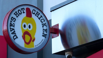 The logo for Dave's Hot Chicken restaurant is seen in the Little Tokyo district of Los Angeles Monday, June 2, 2025.