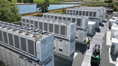 A worker walks through Energy Vault's facility, a company that is creating an emergency power system that relies on hydrogen and battery storage, on Tuesday, May 27, 2025, in Calistoga, Calif.