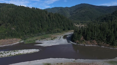 Blue Creek, center, flows into the Klamath River, Sept. 19, 2024, in Humboldt County, Calif.