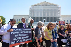 Activists with the Poor People's Campaign protest against spending reductions outside the Supreme Court, June 2, 2025.