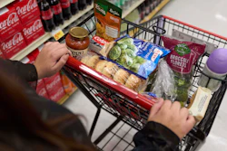 A shopper pushes a cart of groceries at a supermarket in Bellflower, Calif., Feb. 13, 2023.