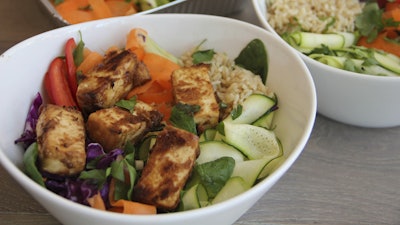 A Thai peanut, vegetable and tofu bowl displayed for a photograph in Coronado, Calif., April 29, 2017.