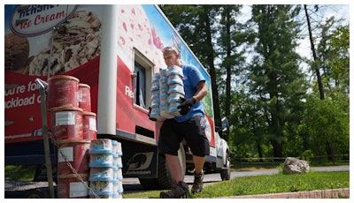 Hershey's Ice Cream delivery driver Sam Sattazahn delivers ice cream to Pine Grove Furnace general store, home of the half-gallon ice cream challenge, at Pine Grove Furnace State Park in Pennsylvania on Tuesday, June 10, 2025.