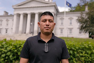 Dairy farmworker José Molina-Aguilar stands outside the Vermont Statehouse after a rally for housing rights for migrant farmworkers in Montpelier, Vt., June 13, 2025.