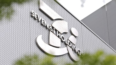 The logo of Seven & i Holdings Co., the Japanese operator of the 7-Eleven convenience store chain is seen on May 27, 2025, in Tokyo.