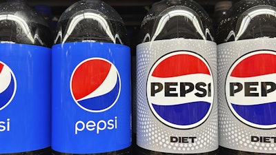 Plastic bottles of Pepsi are displayed at a grocery store in New York on Nov. 15, 2023.