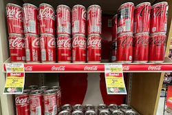 Coca-Cola cans are displayed at a grocery store in Mount Prospect, Ill., Thursday, July 17, 2025.