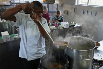 A culinary student pours a cooked soup into a container, Johannesburg, South Africa, July 18, 2025.