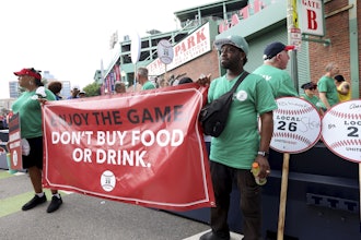 Concession workers from Fenway Park picket outside the ballpark Friday, July 25, 2025, in Boston before a baseball game between the Boston Red Sox and the Los Angeles Dodgers.
