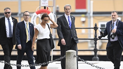 U.S. Treasury Secretary Scott Bessent, second from right, walks outside Rosenbad ahead of trade talks between the U.S. and China, Stockholm, July 29, 2025.