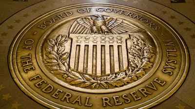 In a Feb. 5, 2018, file photo, the seal of the Board of Governors of the United States Federal Reserve System at the Marriner S. Eccles Federal Reserve Board Building, Washington.