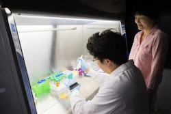 Binghamton PhD student Tianzheng Liu, left, and biomedical engineering professor Sha Jin have developed a method to turn food waste into biodegradable plastic.