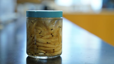 A jar of krill sits on a lab counter at the Virginia Institute of Marine Science, Gloucester Point, Va., May 10, 2023.