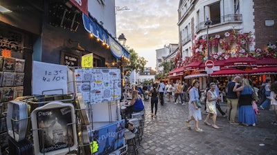 Tourists stroll in the Montmartre district in Paris, Aug. 4, 2025.