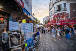 Tourists stroll in the Montmartre district in Paris, Aug. 4, 2025.