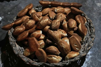 Freshly baked bread called 'pan de batalla,' or battle bread, which uses government subsidized flour, sits in a basket at a bakery in El Alto, Bolivia, Friday, Aug. 8, 2025.