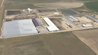 This image taken from video provided by DENVER7 shows a dairy in Keenesburg, Colo., on Thursday, Aug. 21, 2025, where authorities say six people died from an apparent accident involving exposure to gas.