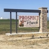 A sign stands at Prospect Ranch outside of Prospect Valley Dairy east of Keenesburg, Colo., Aug. 21, 2025.