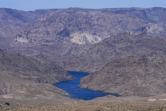 The Colorado River cuts through Black Canyon, June 6, 2023, near White Hills, Ariz.