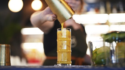 Bartender Shelby Campos mixes a mocktail at the non-alcoholic Good News Bar, Aug. 25, 2025, San Diego.