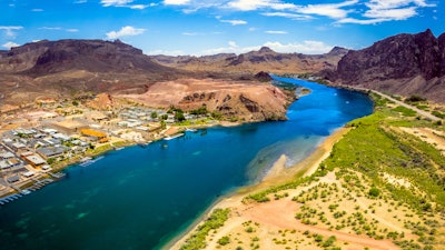 Aerial view of the Colorado River running through the desert near Parker, Arizona.