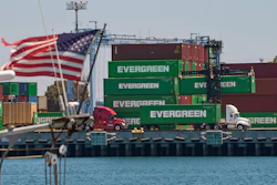 Shipping containers sit stacked at the Evergreen terminal at the port of Los Angeles, Friday, Aug. 1, 2025.