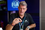 Graeme Lowdon, the team principal of the new Formula One team Cadillac, talks to The Associated Press during an interview at the Silverstone racetrack, ahead of the British Formula One Grand Prix, in Silverstone, England, Sunday, July 6, 2025.